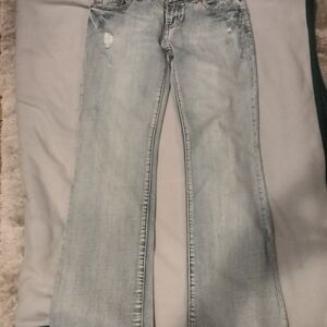 Women's Light Blue Distressed Jeans